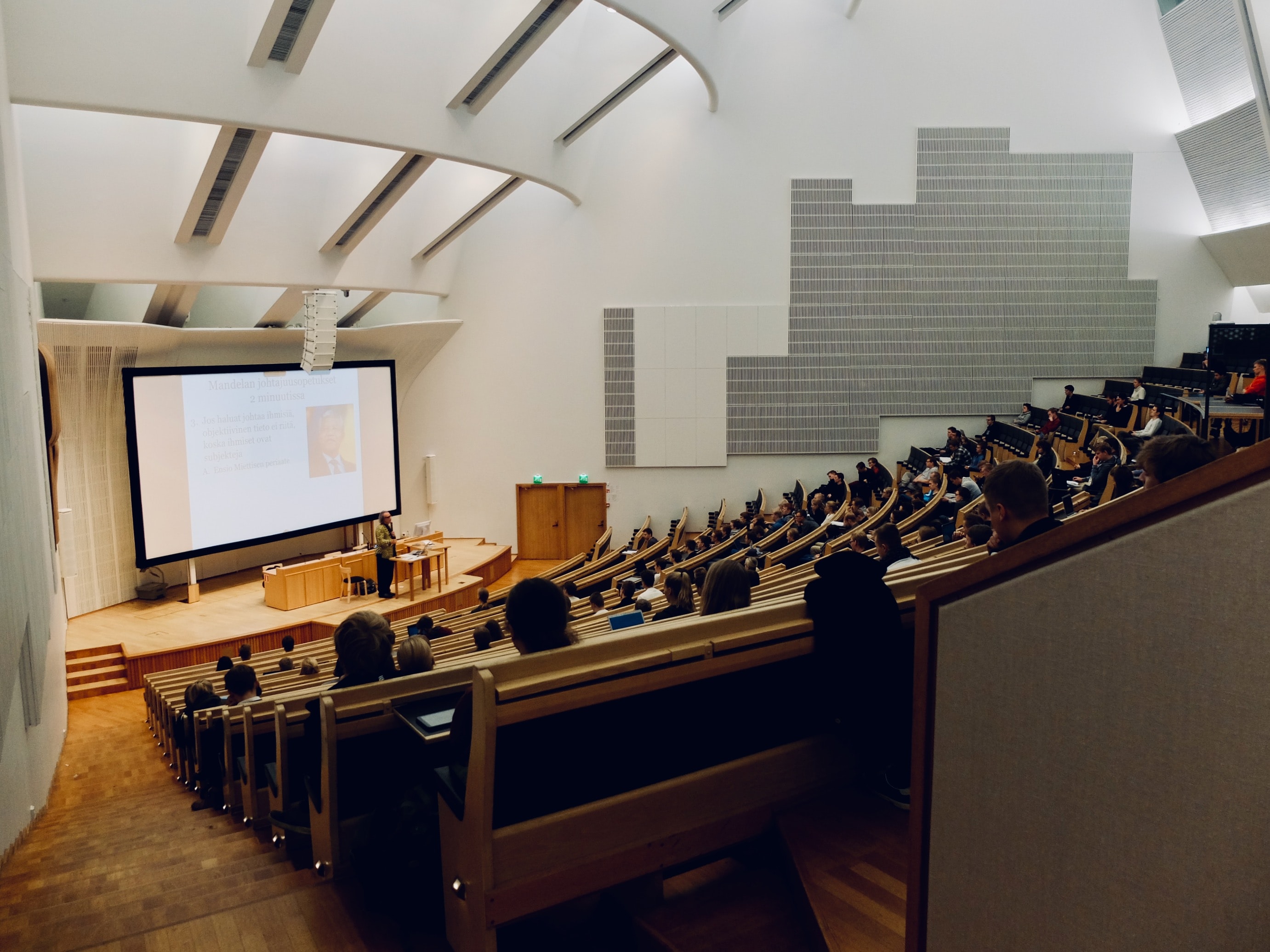 dom-fou-YRMWVcdyhmI-unsplash Students in a lecture theatre