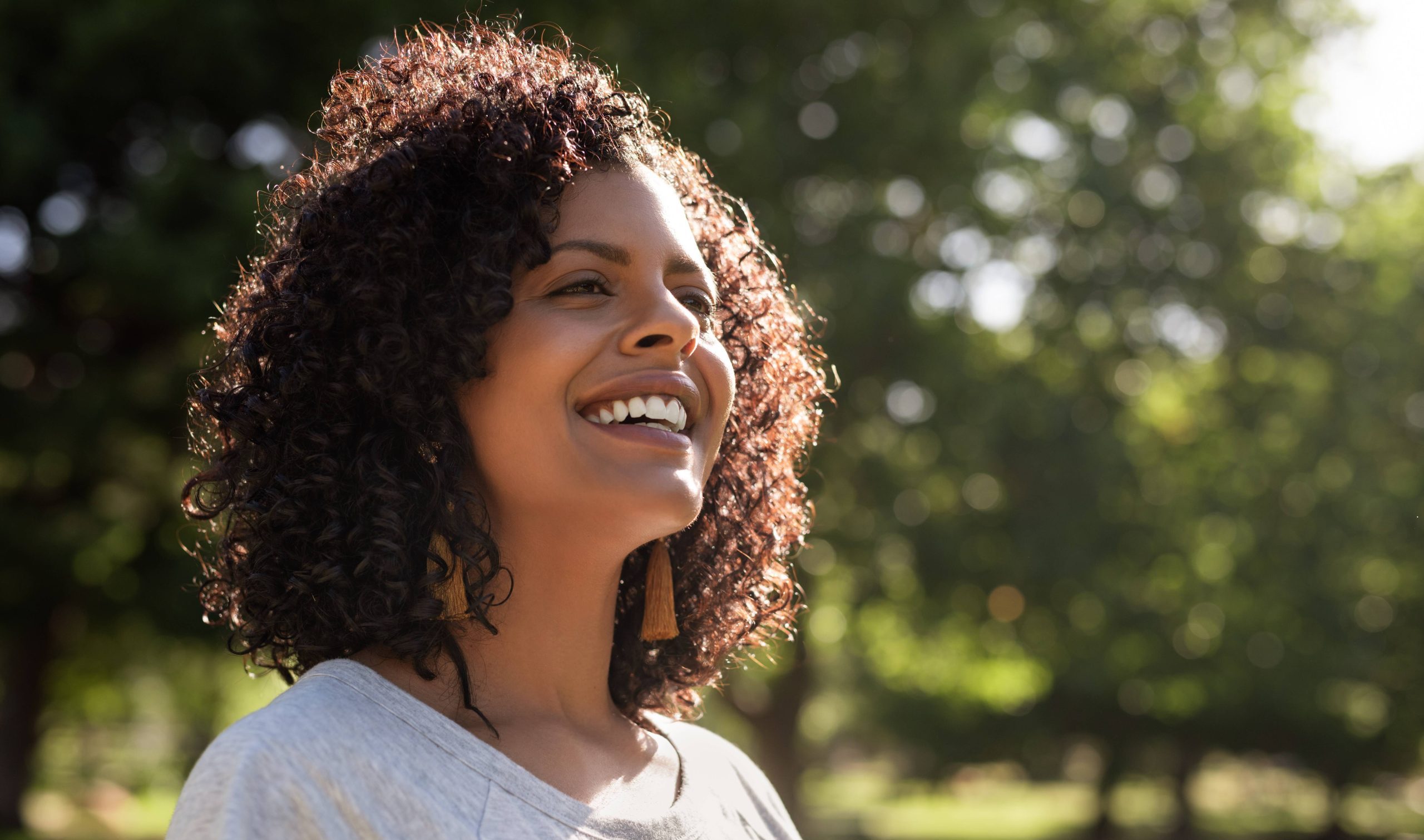 Picture of a lady smiling and showing joy